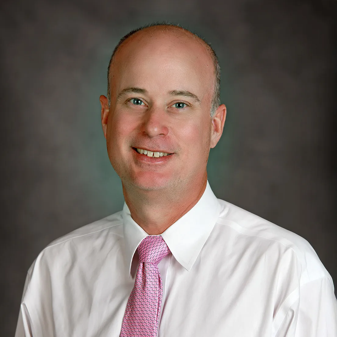 Headshot of J. Kyle Hewett